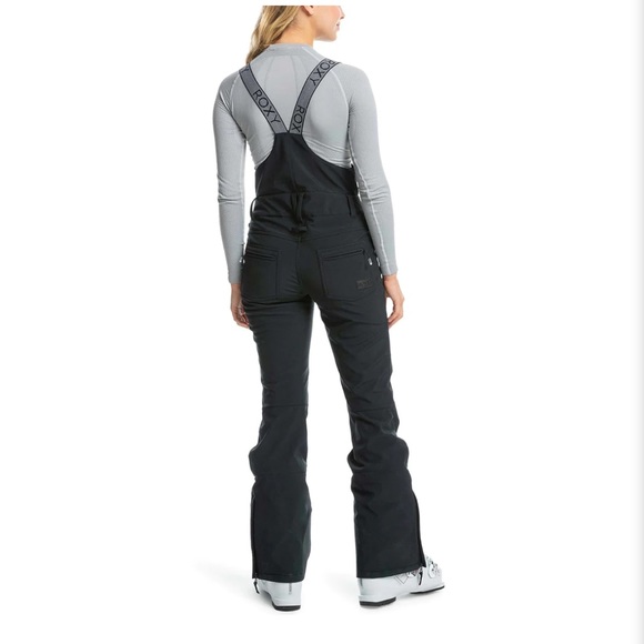 Roxy Women's Summit Bib Pants in pink. - Picture 2 of 9